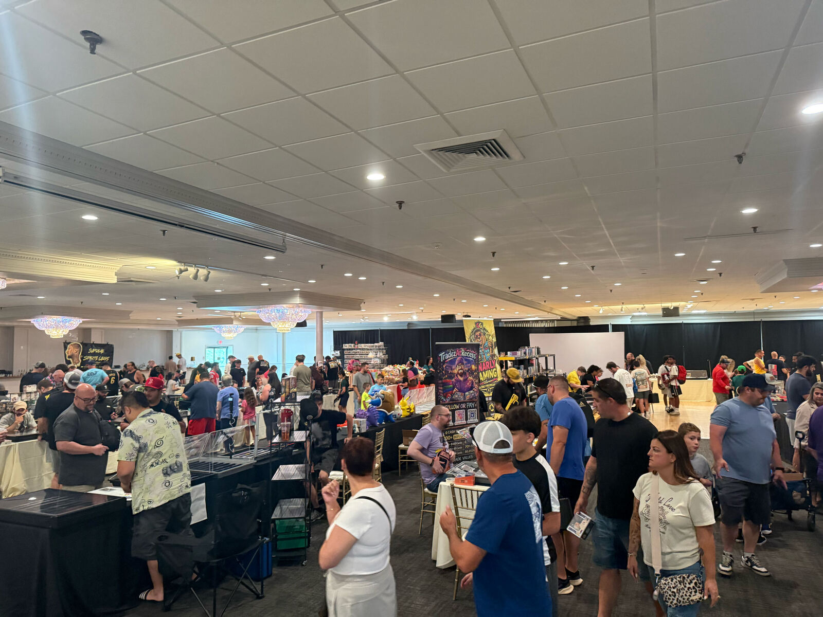 Vendors and collectors at the Summer Slam Card Show